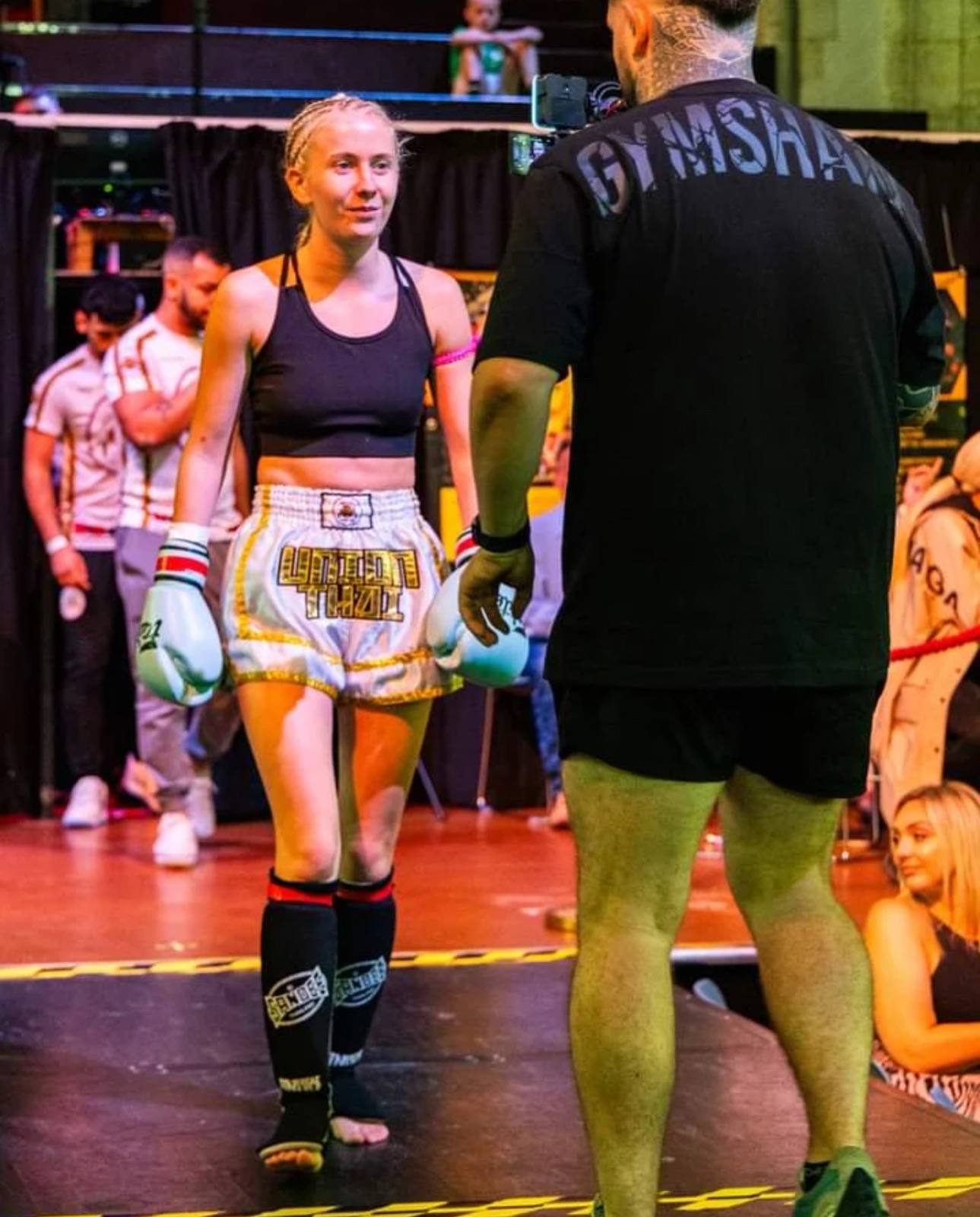 Union Thai female fighter walking out at an event